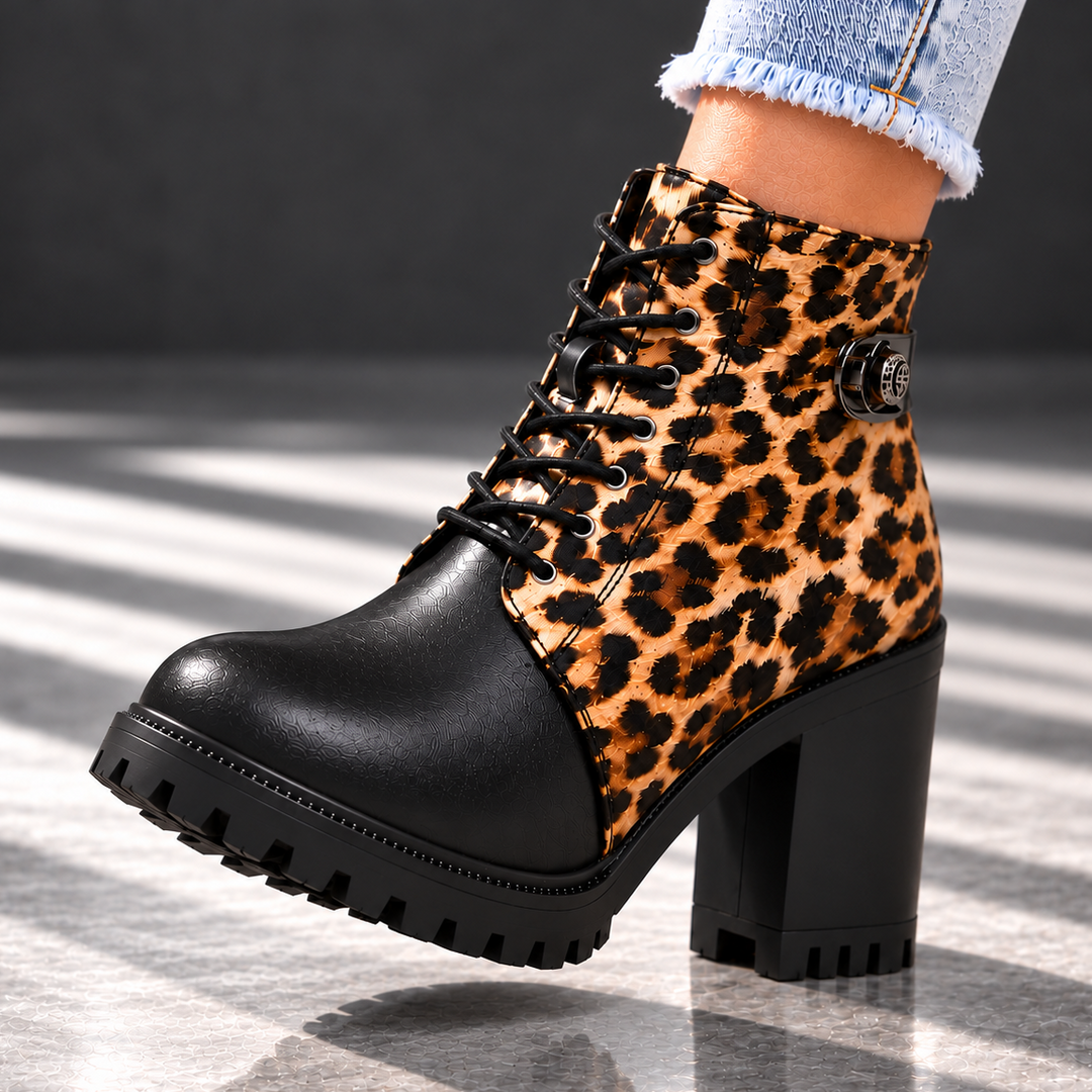 REMI REESE LEOPARD BOOTS
