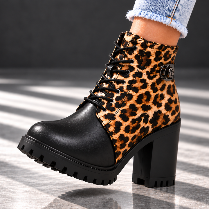 REMI REESE LEOPARD BOOTS