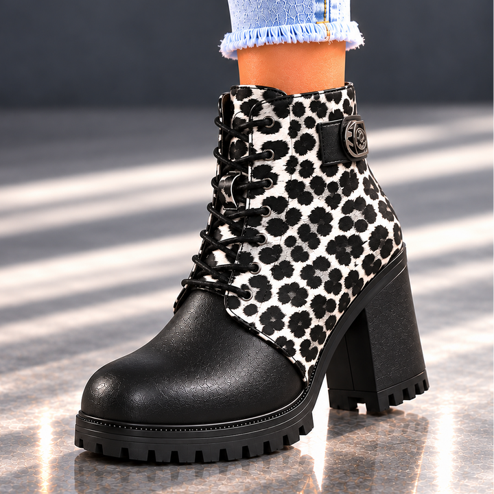 REMI REESE LEOPARD BOOTS