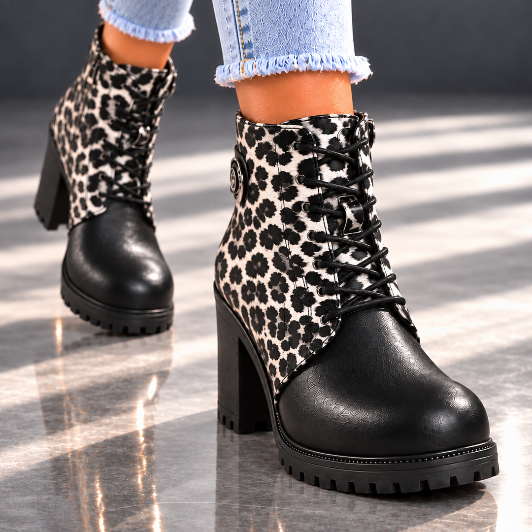 REMI REESE LEOPARD BOOTS