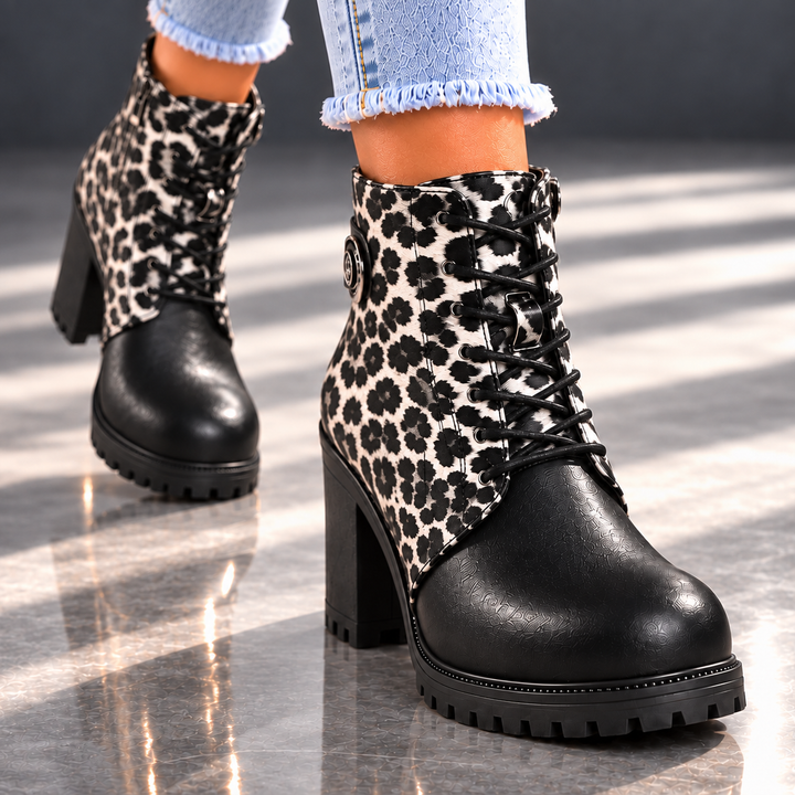 REMI REESE LEOPARD BOOTS