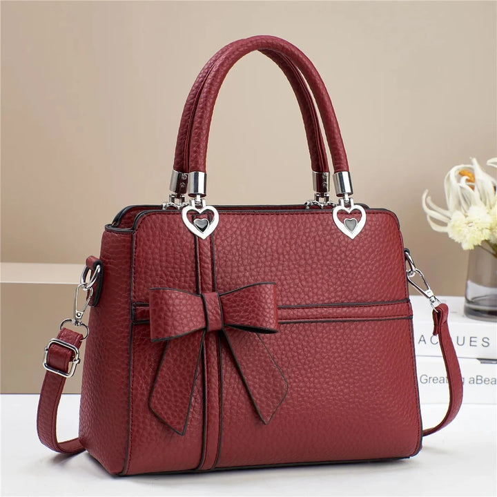 AMARA BOW HEART BAG