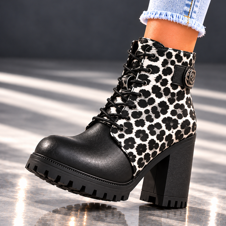 REMI REESE LEOPARD BOOTS