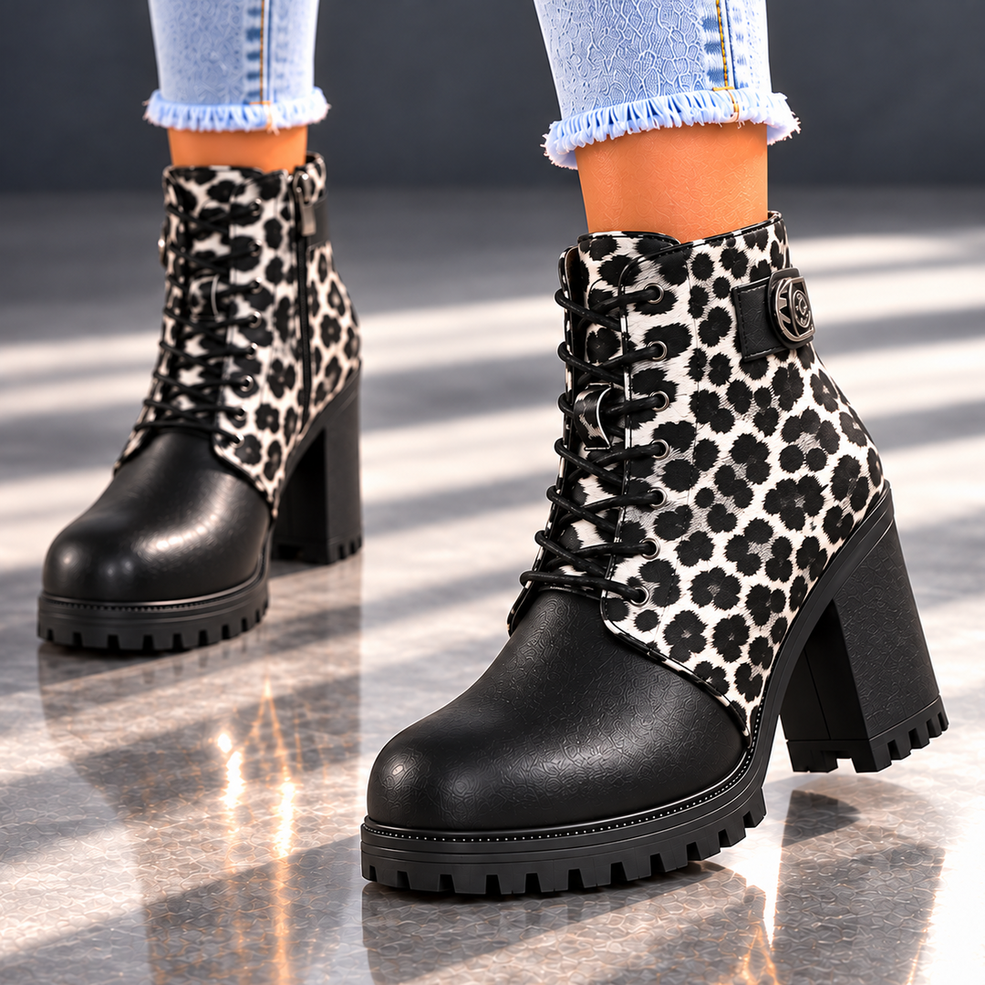 REMI REESE LEOPARD BOOTS