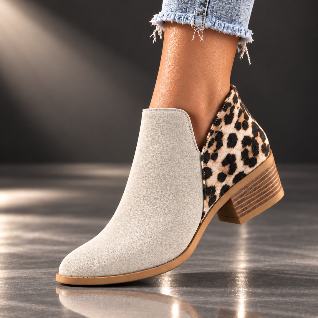 CAMILA REESE LEOPARD BOOTS