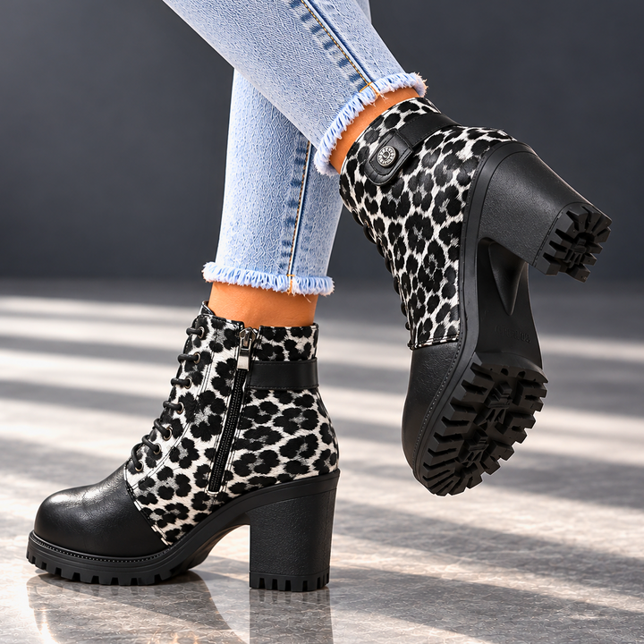 REMI REESE LEOPARD BOOTS