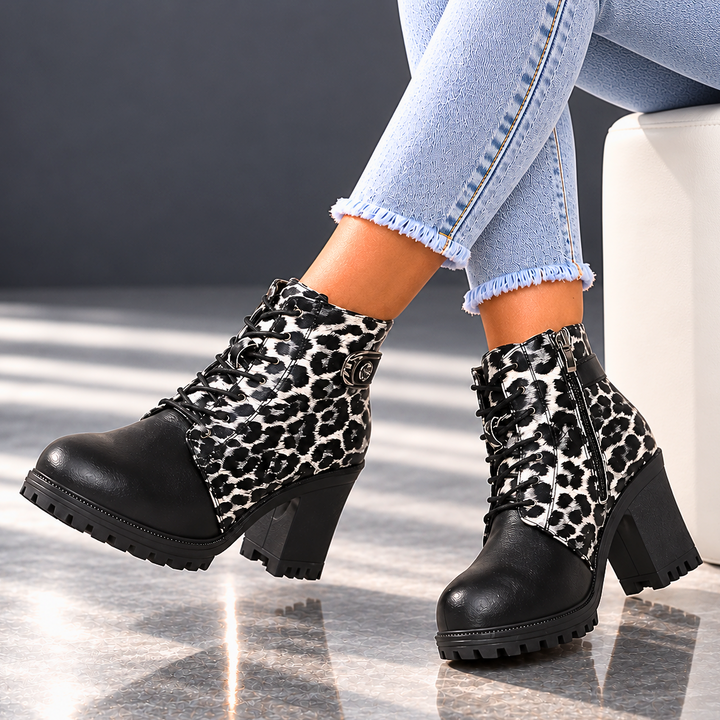 REMI REESE LEOPARD BOOTS